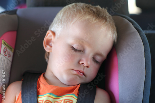 Photo: Boy in child car seat Boy in child car seat