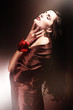 chocolate colored woman with red rose