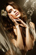 beautiful sexy woman with flowers and water