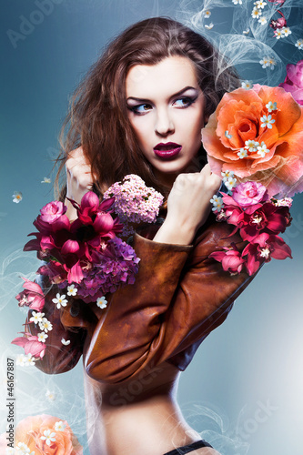 Photo: pretty attractive erotic woman in brown jacket with big flowers pretty attractive erotic woman in brown jacket with big flowers