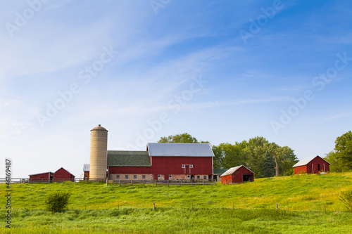 Photo: Traditional American Red Barn With Blue Sky Traditional American Red Barn With Blue Sky