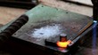 Gas heating cutting metal using torch and bending square bar
