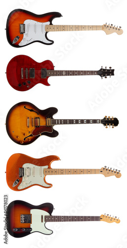 Photo: Group of Five Electric guitars on white background Group of Five Electric guitars on white background