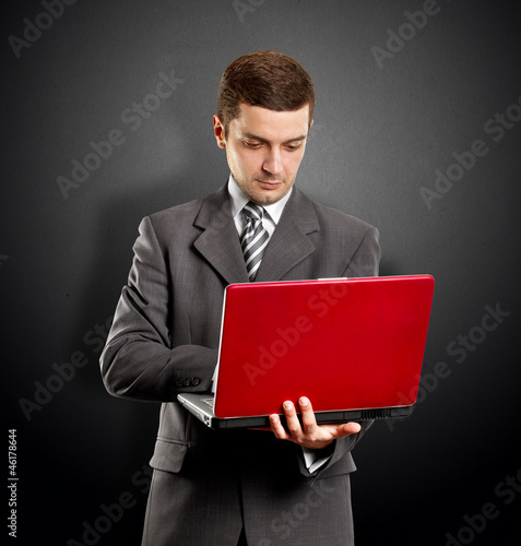 Photo: Business Man With Laptop Business Man With Laptop