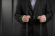 Businessman in jail close up