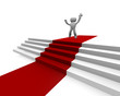 Red carpet on white stairs with a jumping man