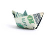 Hundred dollar banknote folded as a boat, finance