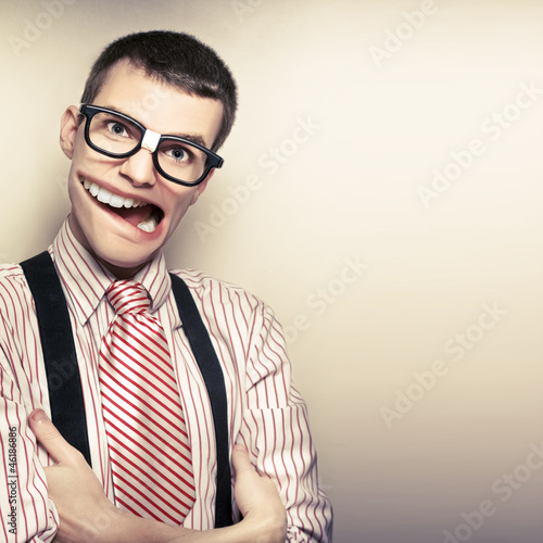Photo: Funny Retro Male Nerd With Big Mouth On Copyspace Funny Retro Male Nerd With Big Mouth On Copyspace