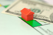 Monopoly hotel (house) on 100 dollar banknote