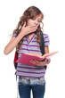 little girl reading book and yawning