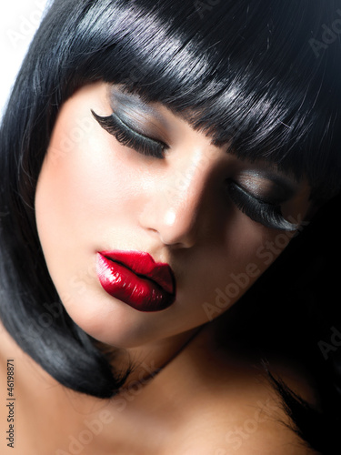 Photo: Sexy Woman. Brunette Girl with Extreme Makeup. Vamp Style Sexy Woman. Brunette Girl with Extreme Makeup. Vamp Style