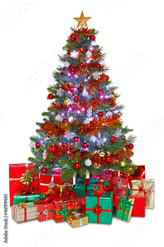 Photo: Decorated Christmas tree isolated Decorated Christmas tree isolated
