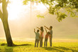 an asian family pointing
