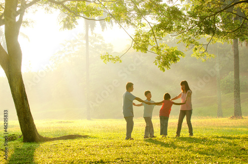 Photo: a family having fun a family having fun