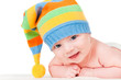 Baby in a cap, isolated on white
