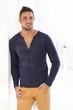 Trendy man standing at home