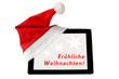Foto: Tablet PC mit Weihnachtsmütze Tablet PC mit Weihnachtsmütze