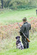 hunter with his dog hunting