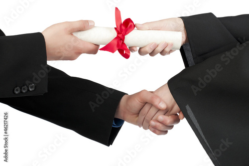 Photo: graduating student hand accepting diploma graduating student hand accepting diploma