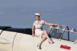 retro navy girl with a vintage aircraft