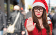 christmas woman doing a stop gesture