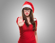 christmas woman doing a stop gesture