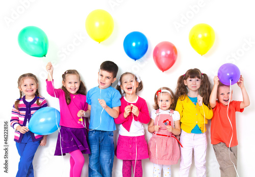  happy children with balloons