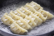 cooking gyoza dumplings, potstickers, japanese food