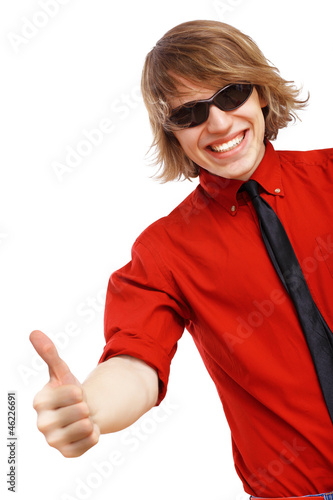 Photo: Happy handsome man showing thumbs up Happy handsome man showing thumbs up