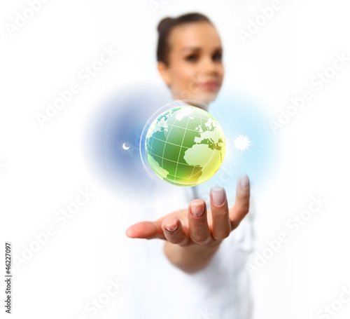 Photo: Human hand holding our planet earth Human hand holding our planet earth