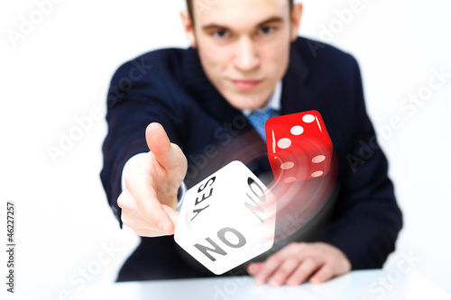 Photo: Flying dices as symbol of risk Flying dices as symbol of risk