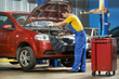 auto mechanic at work with wrench