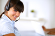 Pretty call center employee smiling at you