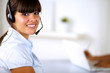 Beautiful young woman wearing a headset