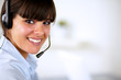 Hispanic young woman wearing headphone