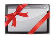 Tablet PC with red ribbon and bow isolated