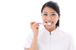 a young asian doctor on white background