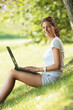 Woman with laptop outdoor