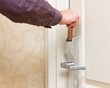 Man opening door with keyless entry card