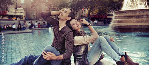 Photo: Happy couple enjoying holidays Happy couple enjoying holidays