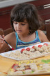 girl painting the martorana fruit