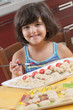 girl painting the martorana fruit