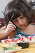 girl painting the martorana fruit