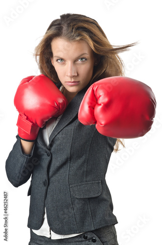 Photo: Young businesswoman in boxing concept Young businesswoman in boxing concept
