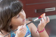 girl painting the martorana fruit
