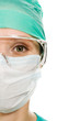 Surgeon woman in protective glasses and mask