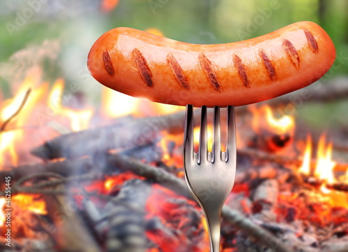 Photo: Sausage on a fork. Sausage on a fork.