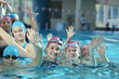 happy childrens at swimming pool