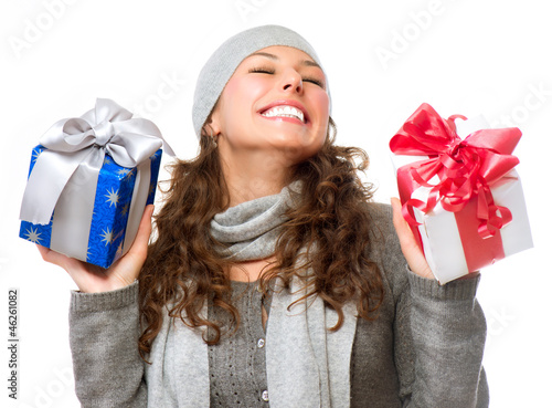 Photo: Happy Young Woman With Christmas Gifts. Gift Box Happy Young Woman With Christmas Gifts. Gift Box