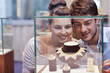 Photo: happy young couple in jewelry store happy young couple in jewelry store